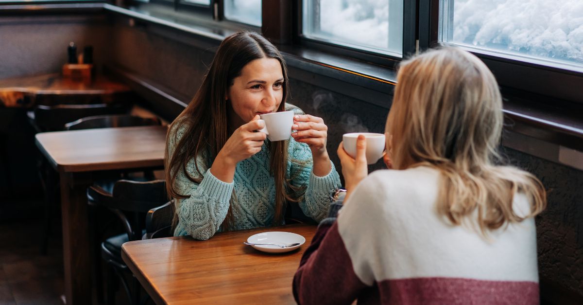 Two preschool teachers having coffee as they get to know each other