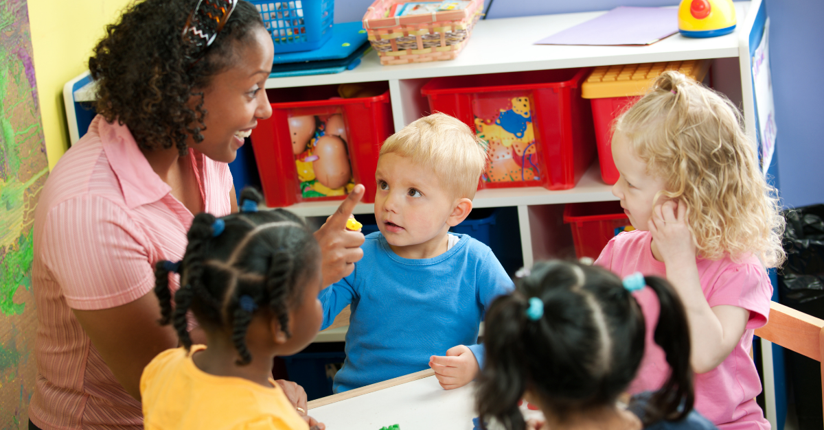An ECE on the first day working to create classroom routines
