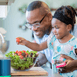 Toddler and teacher learning about food