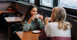 Two preschool teachers having coffee as they get to know each other