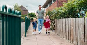 A parent of young children dropping them off at a center he researched throughly