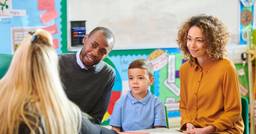 Preschool family at a parent-teacher conference