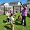 Teacher outside with group of children