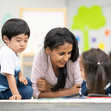 educator with children in classroom