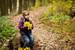 Child with fall leaves