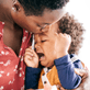 child showing emotion with caregiver