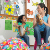 music in preschool classroom with teacher