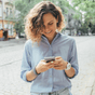 Women texting on cell phone