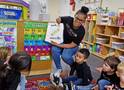 Educator reading to children