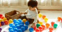 Toddler freely playing with materials after being given an invitation to play